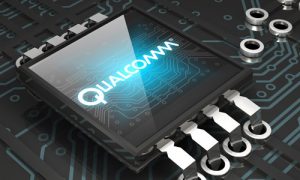 3d illustration of a glowing blue Qualcomm logo sitting on top of a glossy microchip