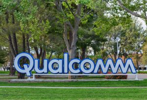 qualcomm logo with background trees